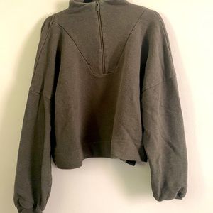 green sweatshirt with zip